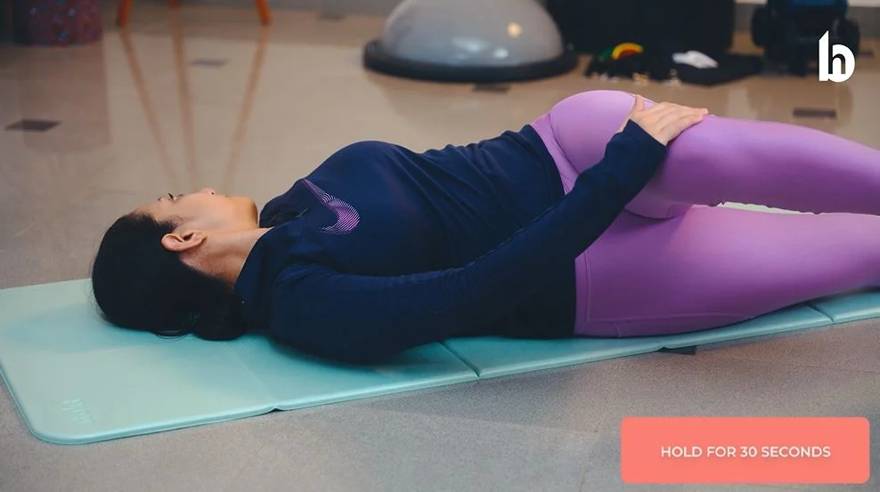 Lumbar rotation or piriformis stretch