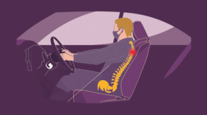 Driver sitting in a car seat with proper seat angle adjustment showing lumbar support, slight recline, and ergonomic posture for spinal health.